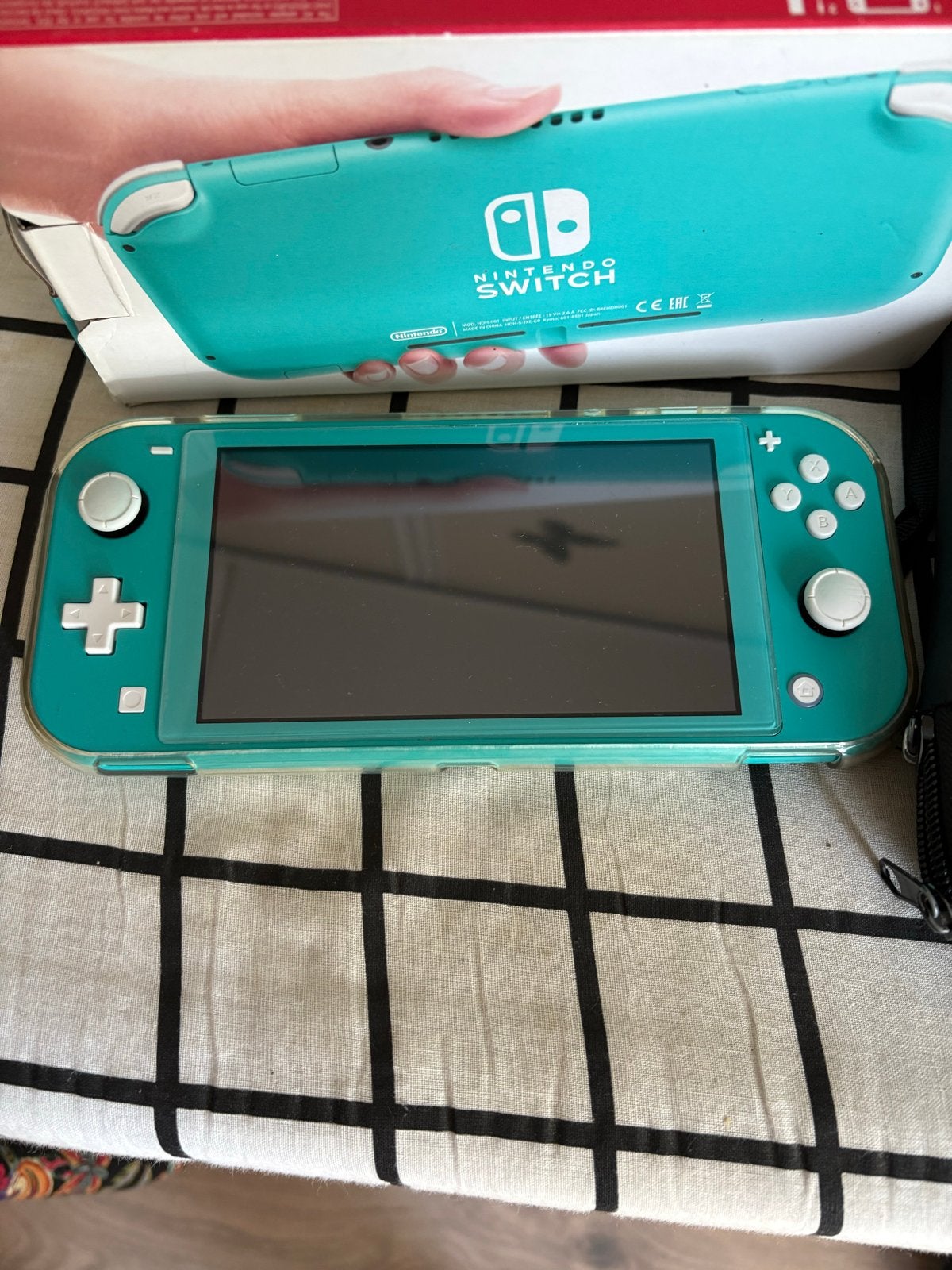 Nintendo Switch Lite Turquoise met hoes en doos, Ophalen of Verzenden, Turquoise, Zo goed als nieuw, Met beschermhoes of tas