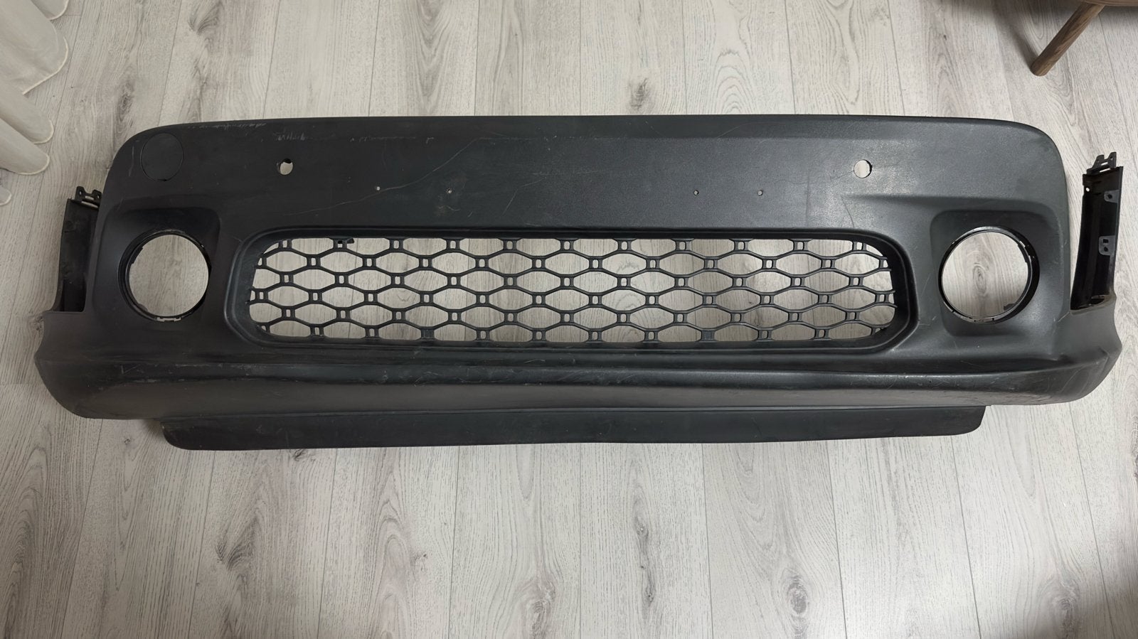 Bumper voor met grille - Jeep 52120515 goede staat, Gebruikt, Voor, Bumper, Ophalen