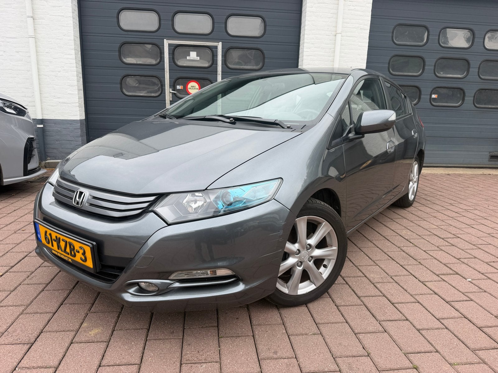 Honda Insight 1.3 Hybrid Elegance AUT 2010 Grijs NAP, Auto's, Euro 6, 4 cilinders, 22 km/l, Zilver of Grijs