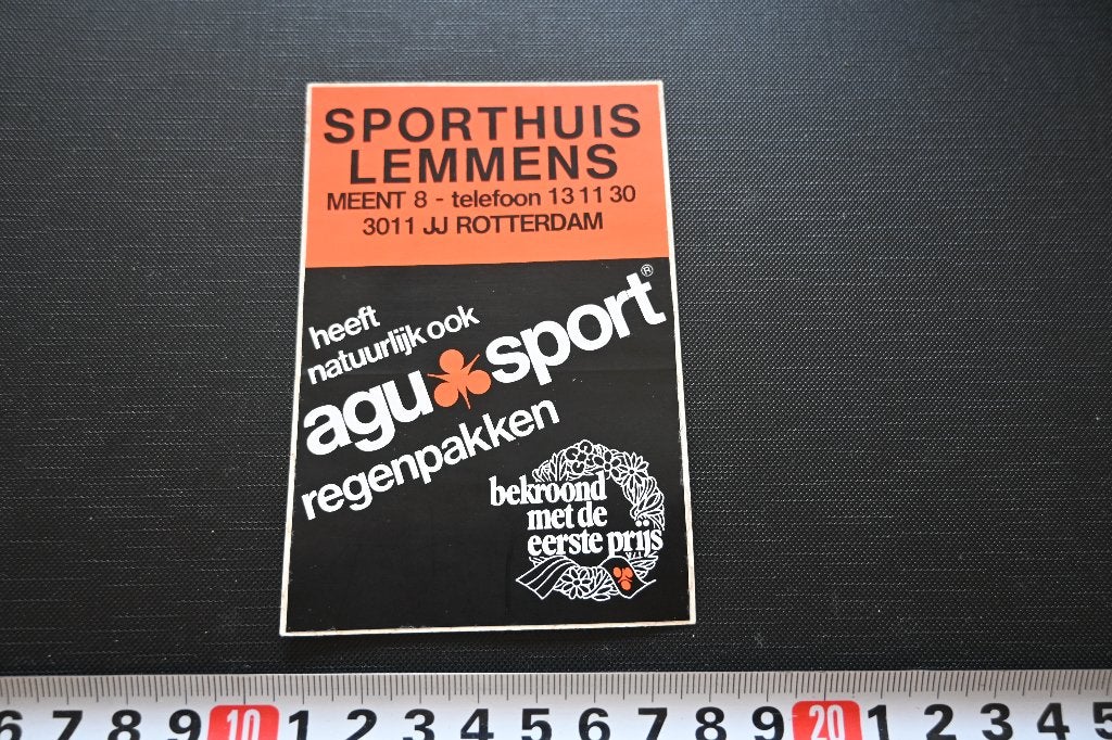 sticker rotterdam sporthuis lemmens agu-sport regenpakken, Ophalen, Zo goed als nieuw