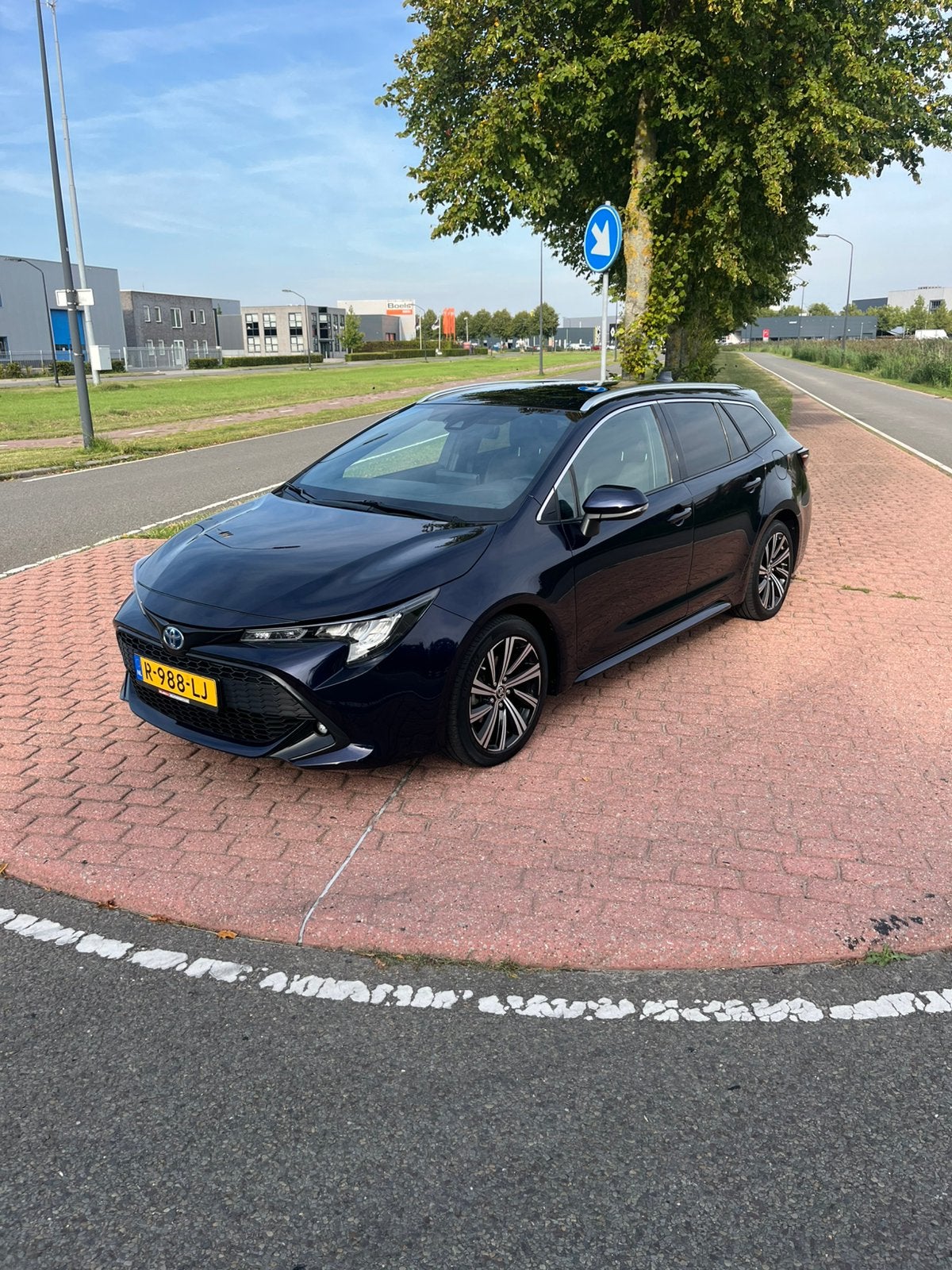 Toyota Corolla TS 1.8 Hybrid 122pk CVT 2022 Blauw, Auto's, Toyota, 1345 kg, Blauw, Stationwagon, Corolla TS