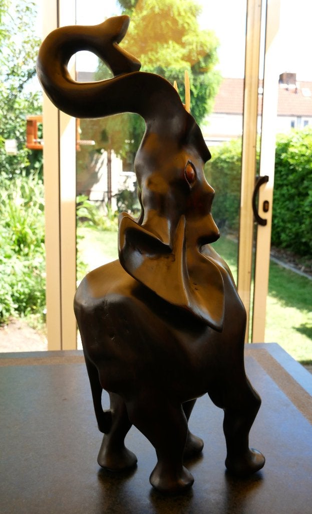 houten beeld olifant, Ophalen