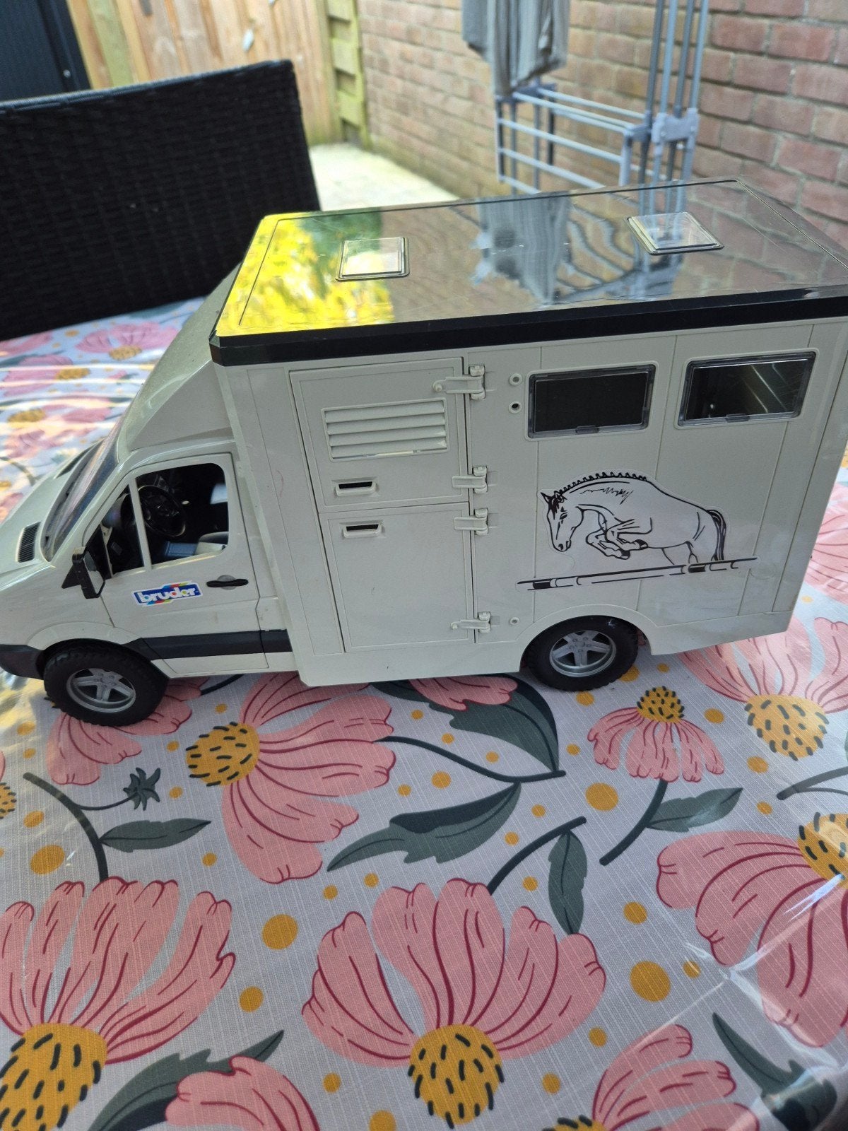 bruder paarden auto, Ophalen