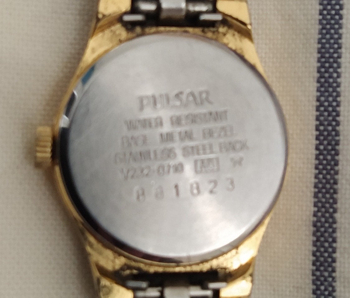 Pulsar dames horloge waterresistent. Schakelband in goud/zil, Ophalen, Staal, Overige merken