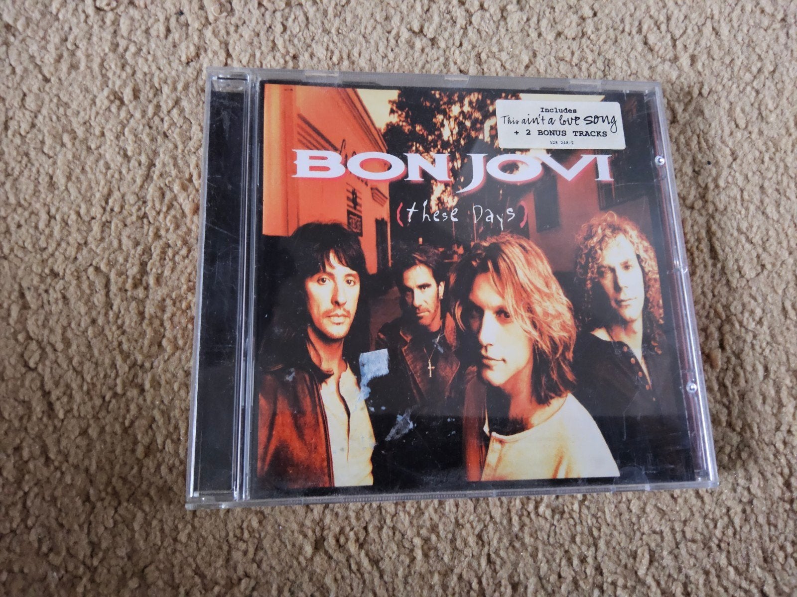 Bon Jovi - These Days CD (met bonus tracks), Gebruikt, Met bonustracks, Ophalen of Verzenden, Classic Rock