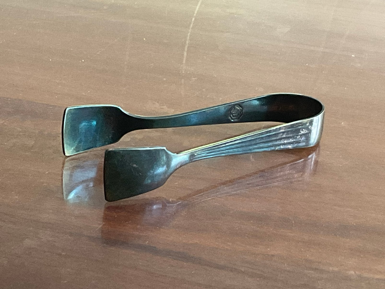 Verzilverde suikertang model Ampire van DE Douwe Egberts, Antiek en Kunst, Ophalen of Verzenden
