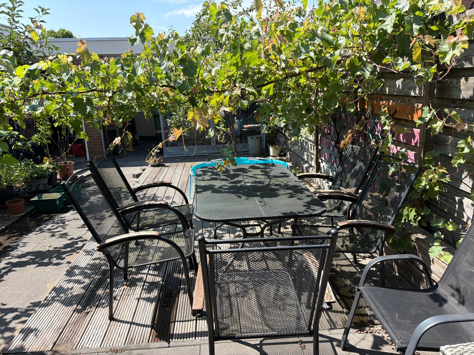 Zwarte metalen tuinset met 5 stoelen en tafel, Ophalen, Overige materialen, Gebruikt, Eettafel