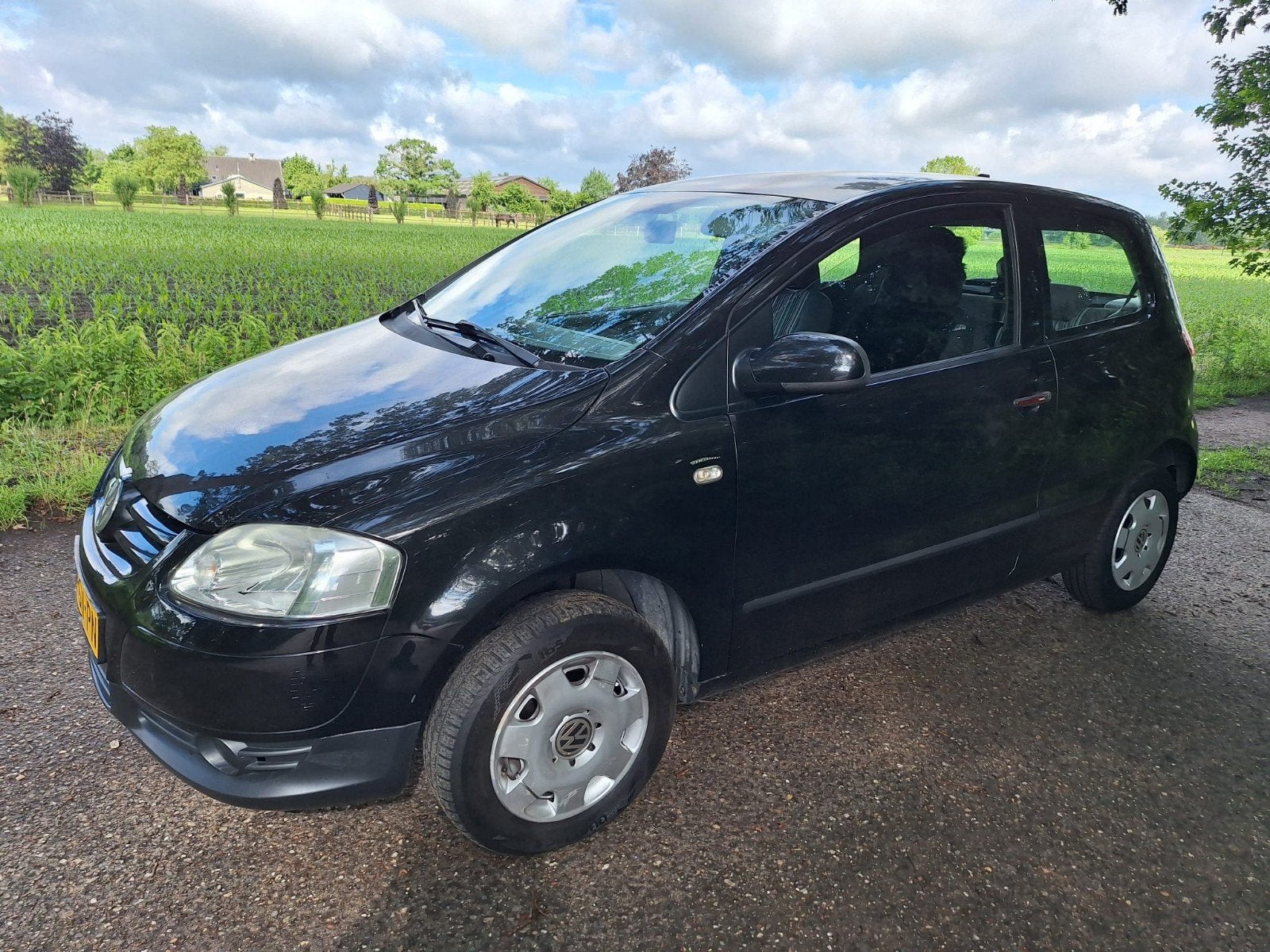 VW Fox 1.4 55KW 2006 Zwart, Auto's, Volkswagen, Voorwielaandrijving, Zwart, 4 cilinders, 4 stoelen