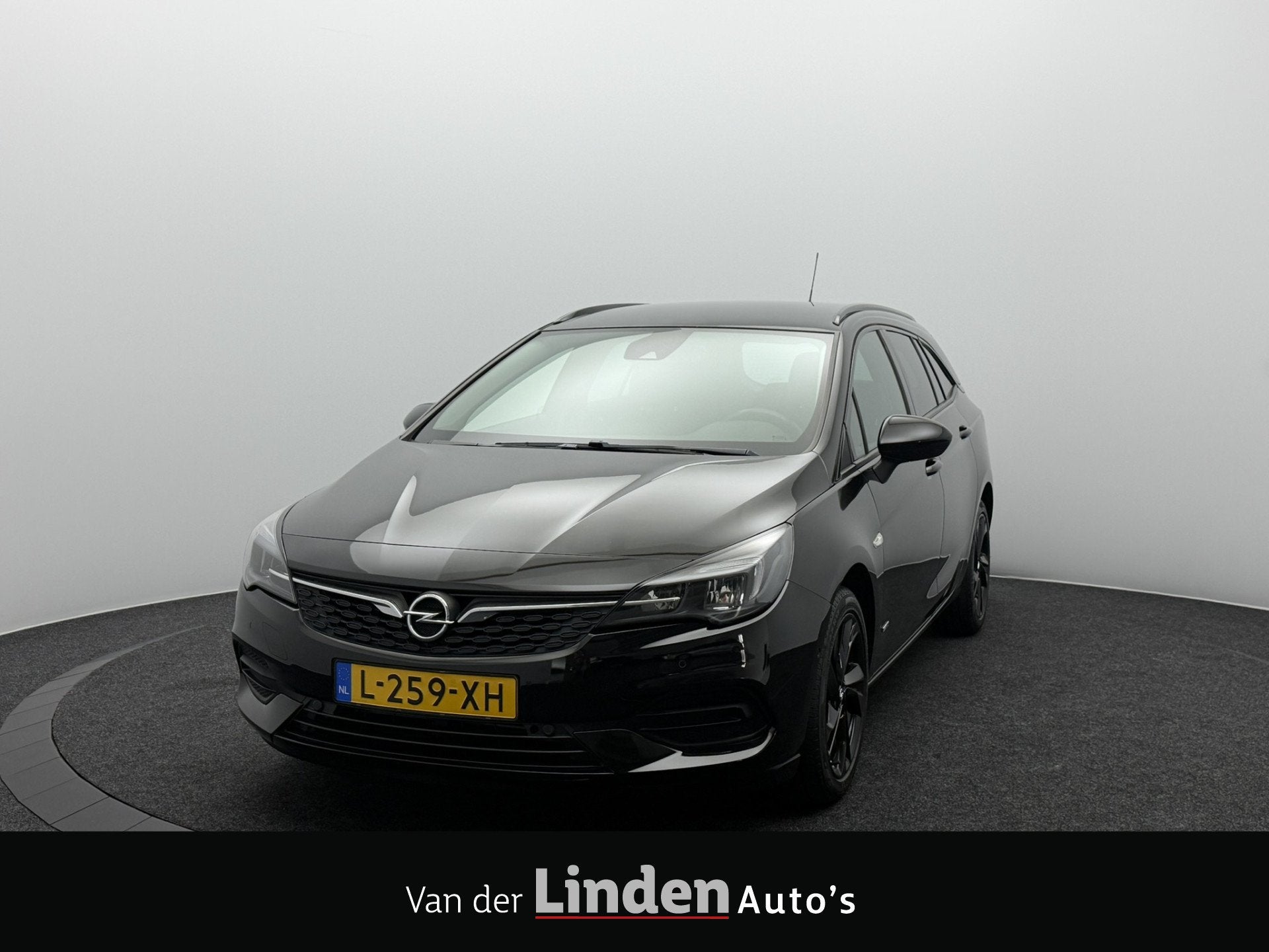 Opel Astra Sports Tourer 1.2 130PK Design & Tech | Camera |, Auto's, Dealer onderhouden, 1199 cc, Leder en Stof, Zwart