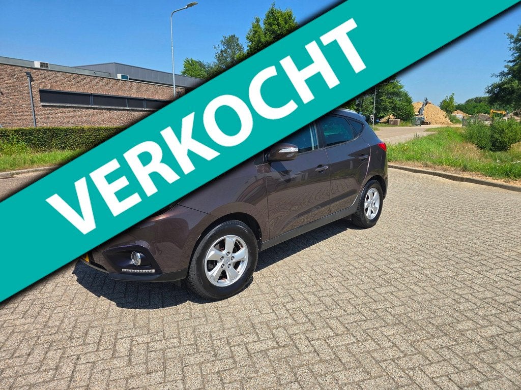 Hyundai Ix35 2.0i Business Edition luxe uitvoering! AIRCO, Auto's, Hyundai, Gebruikt, 4 cilinders, Bruin, Leder en Stof
