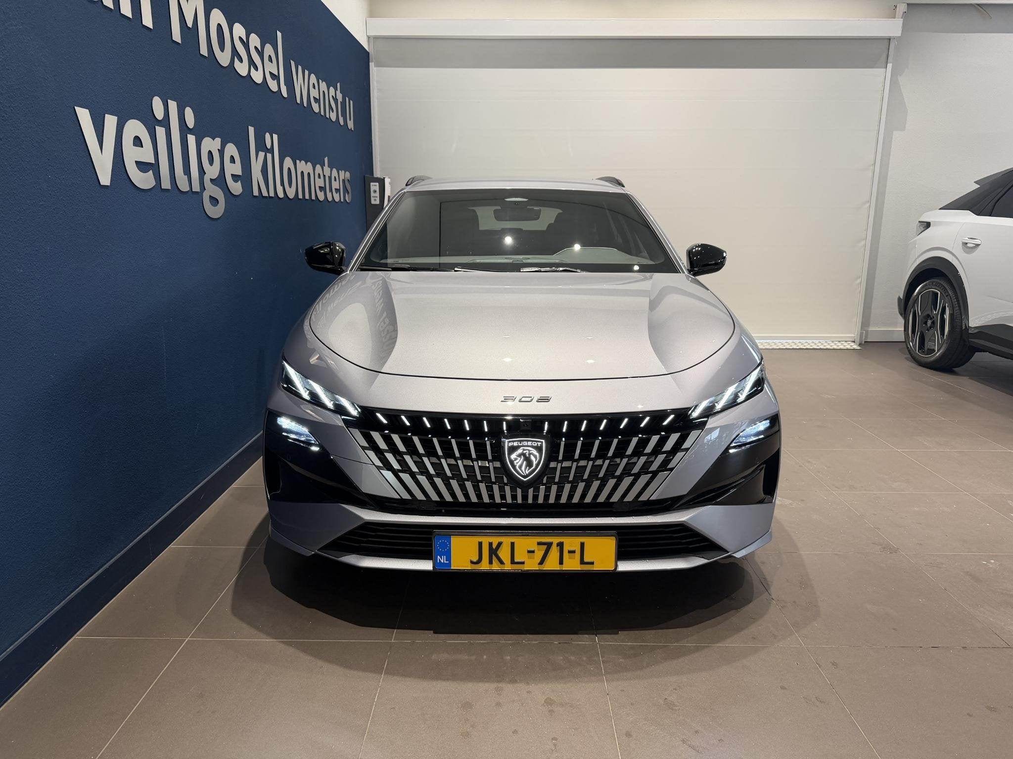 Peugeot 308 SW 1.6 Plug-in Hybrid 195 GT, Auto's, Peugeot, 12 maanden, 4 cilinders, 1650 kg, Leder en Stof