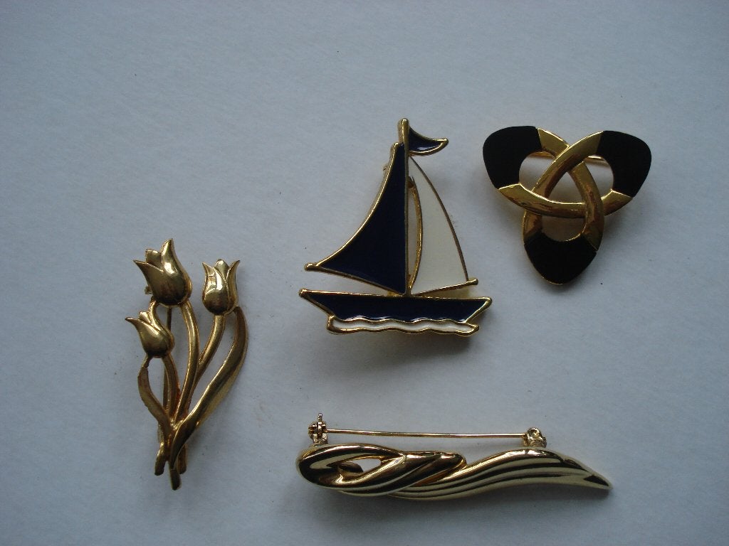 4 x broche tulpen, zeilboot enz. sieraden, Ophalen, Overige materialen, 4 tot 7 cm, Gebruikt