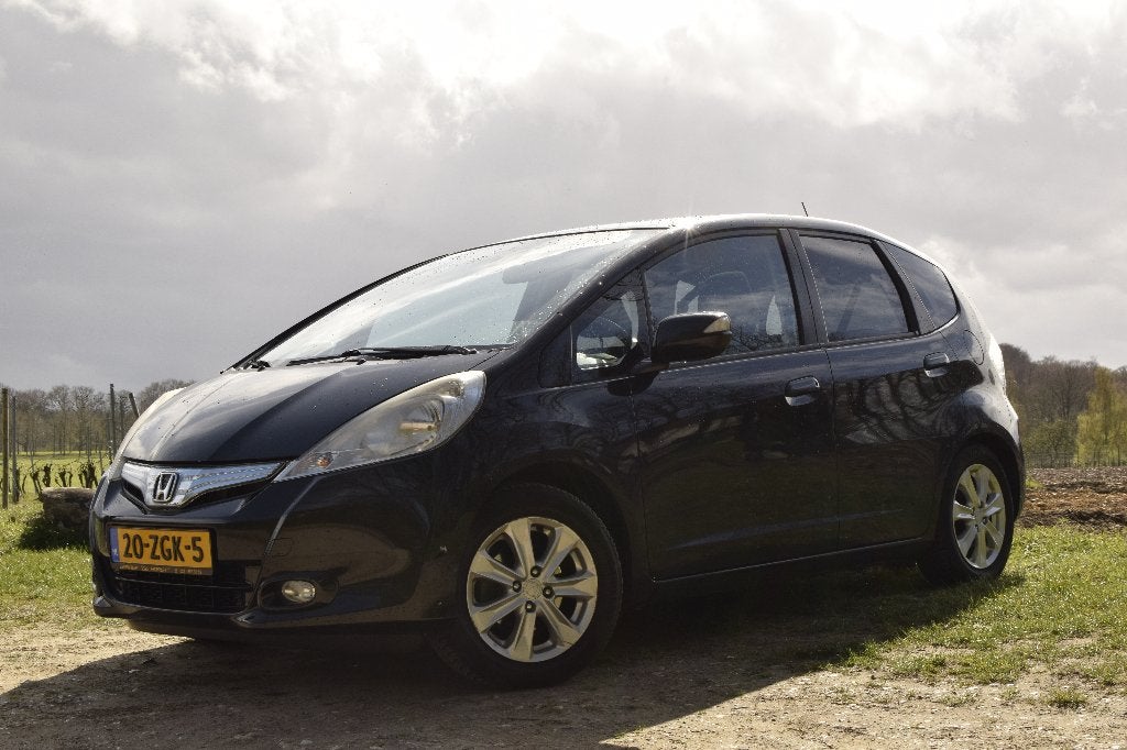 Honda Jazz 1.4 Hybrid Elegance 2012 Zwart, Auto's, Stof, Zwart, 4 cilinders, Elektrische ramen