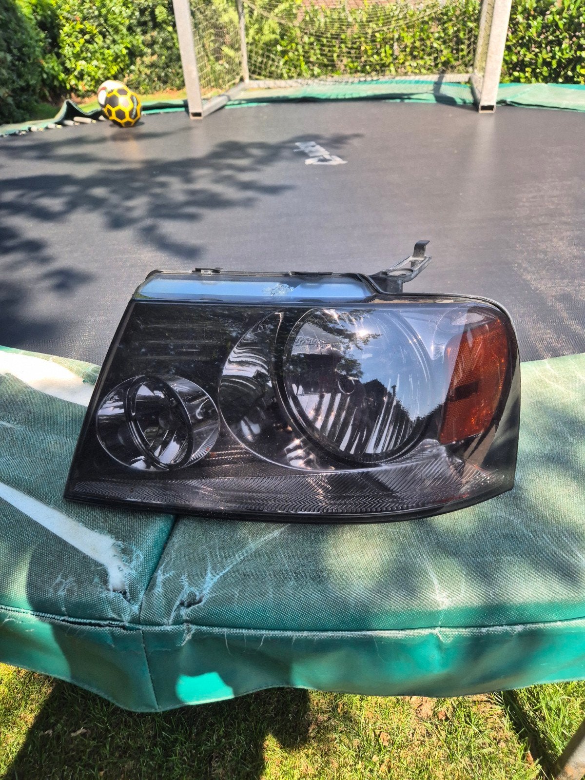 Gesmokte koplampen Ford F150 (2006) - Gebruikt, Auto-onderdelen, Ophalen of Verzenden, Gebruikt, Ford