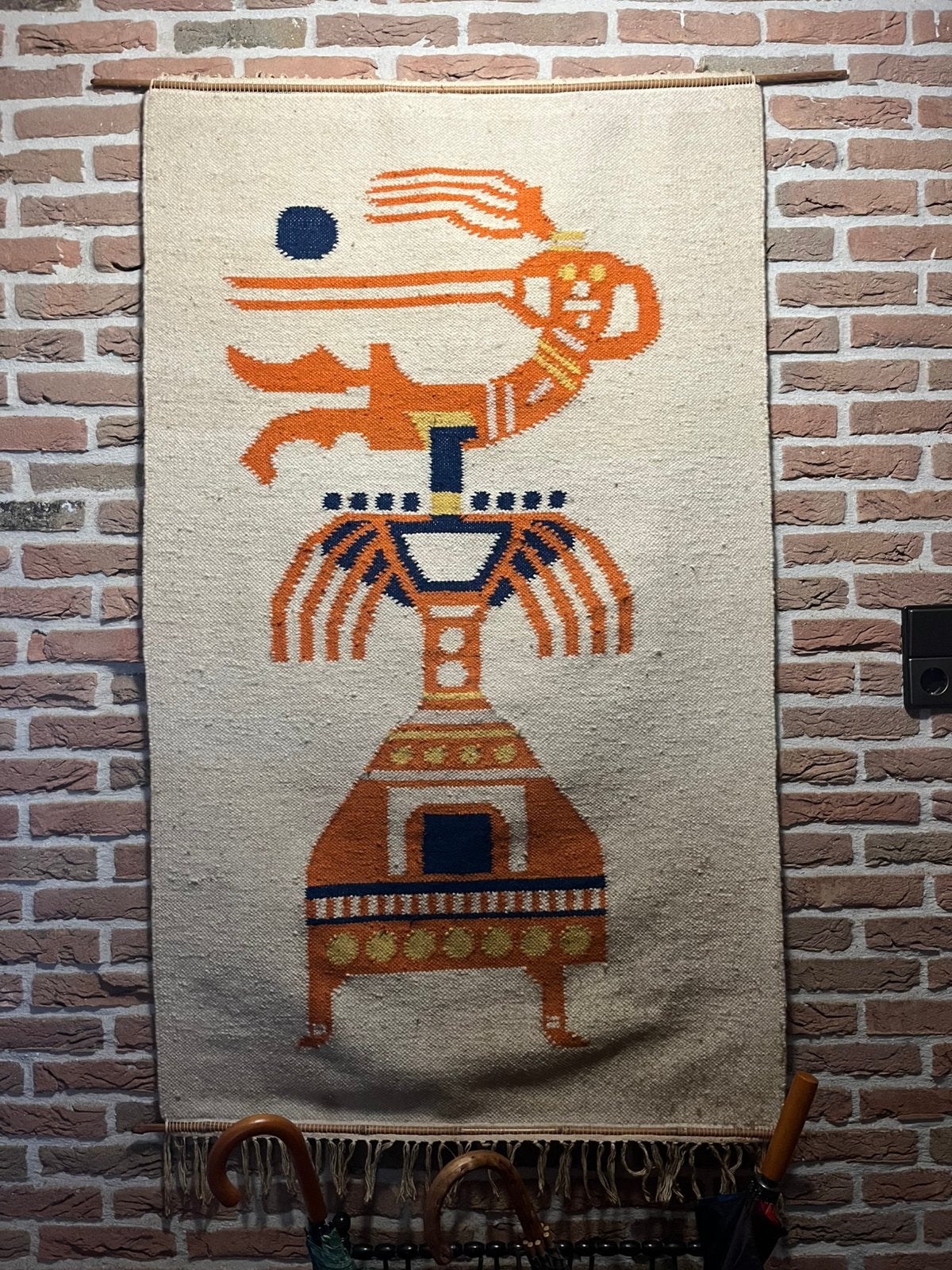 Wollen wandkleed, Ophalen