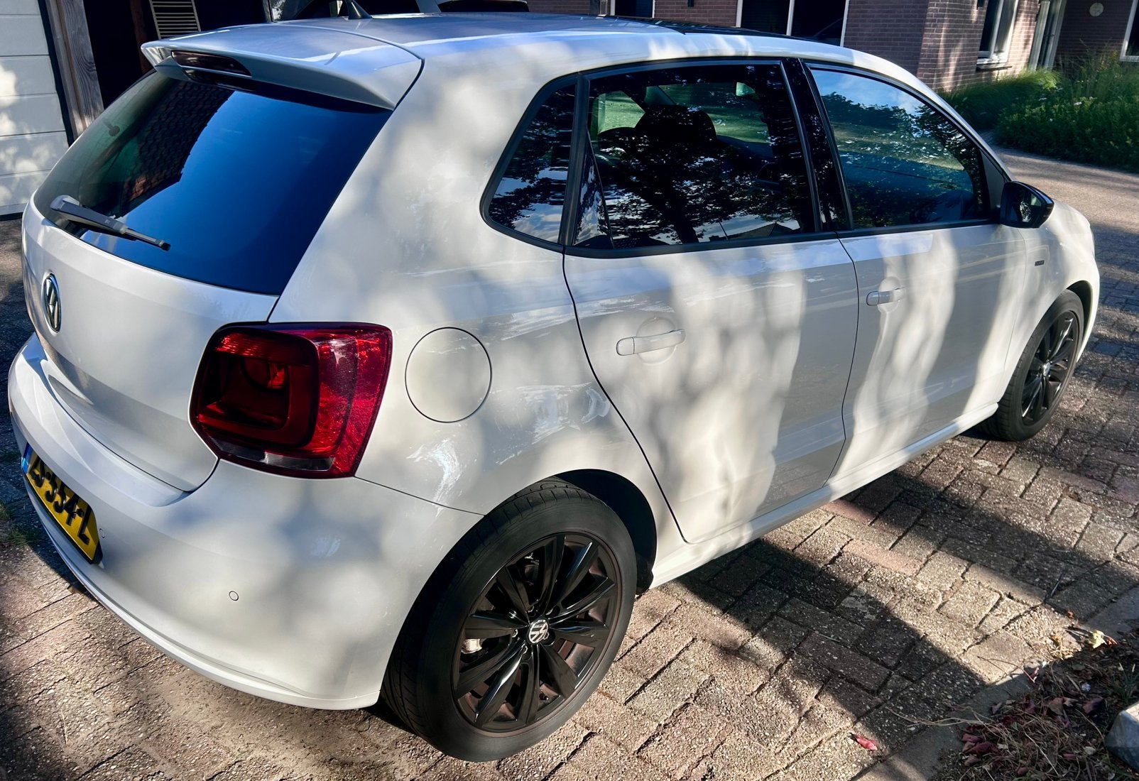 Volkswagen Polo 1.2 TSI|Panoramadak|CarPlay|Stoelverwarming, Voorwielaandrijving, 40 €/maand, Zwart, 4 cilinders