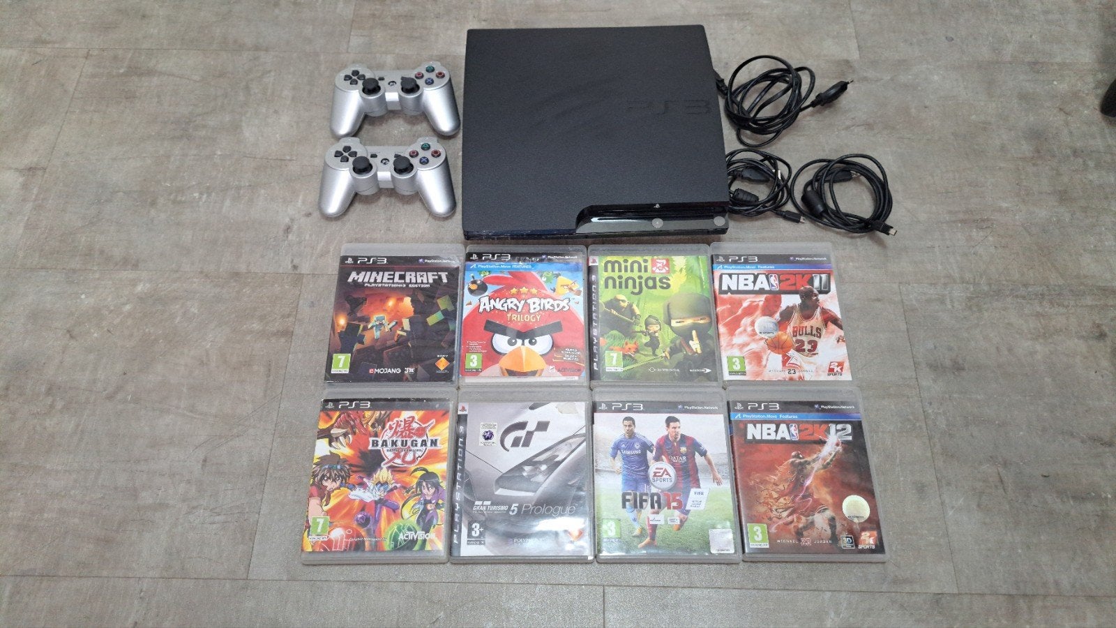 PlayStation 3 Slim met 2 controllers en 8 games, Spelcomputers en Games, Met games, Met 2 controllers, Zo goed als nieuw, Slim