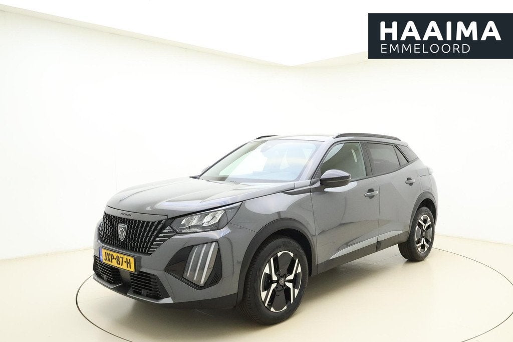 Peugeot 2008 1.2 Hybrid 145 Allure | Climate & Cruise Contro, Auto's, Peugeot, 1272 kg, Euro 6, 1199 cc, Leder en Stof
