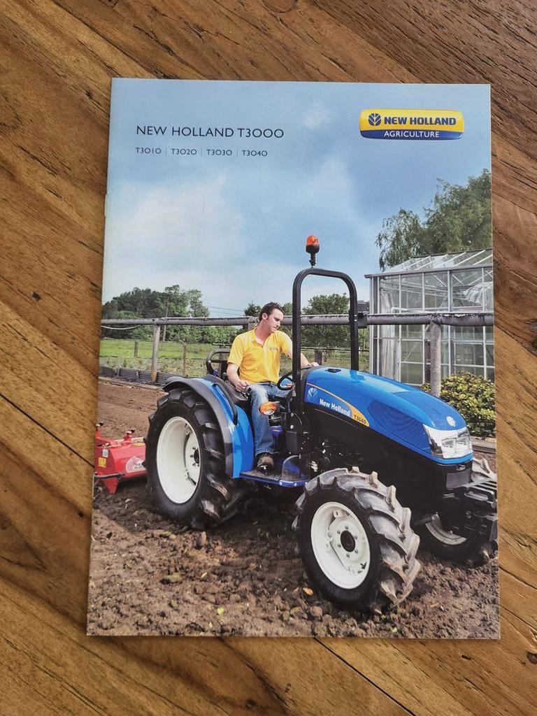 tractor folder New Holland T3000, Ophalen of Verzenden, Zo goed als nieuw