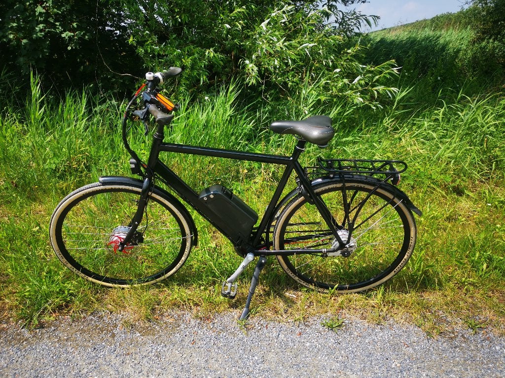 elektrische herenfiets in prima staat, Ophalen, Gebruikt, 30 tot 50 km per accu, Overige merken