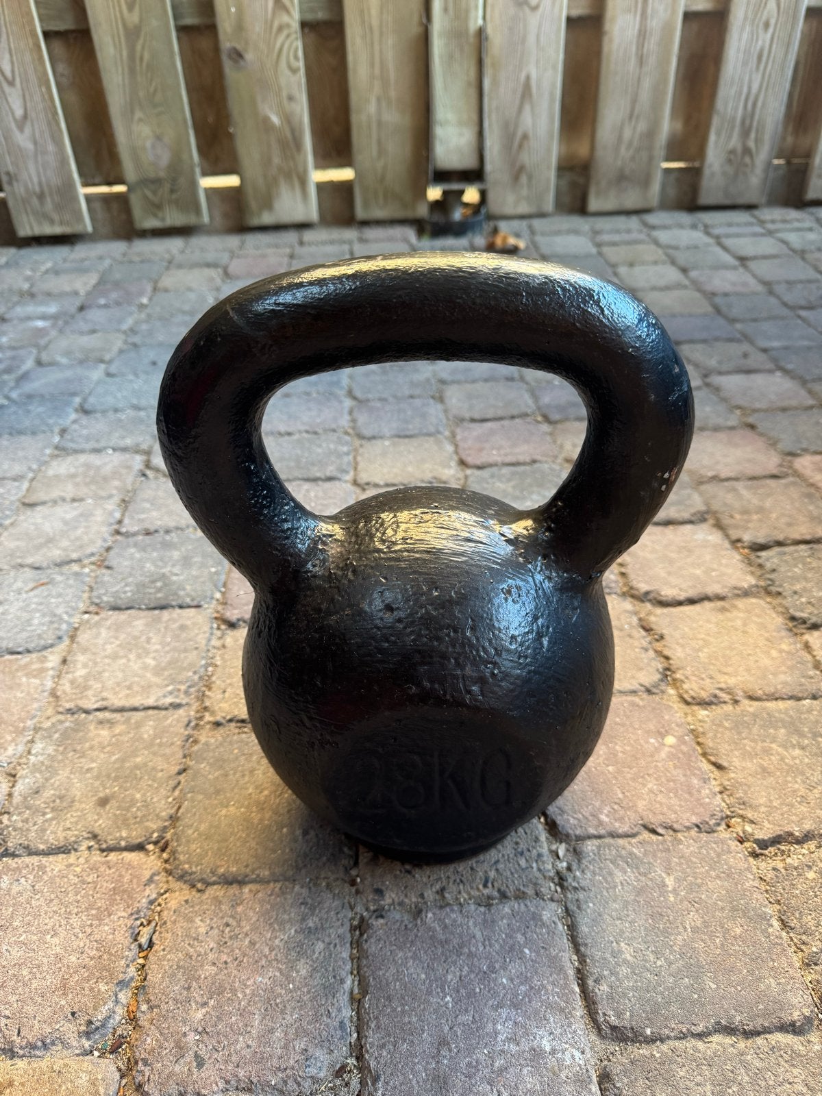 Kettlebell 28 kg gietijzer met rubberen voet, Ophalen, Gebruikt, Armen, Kettlebell
