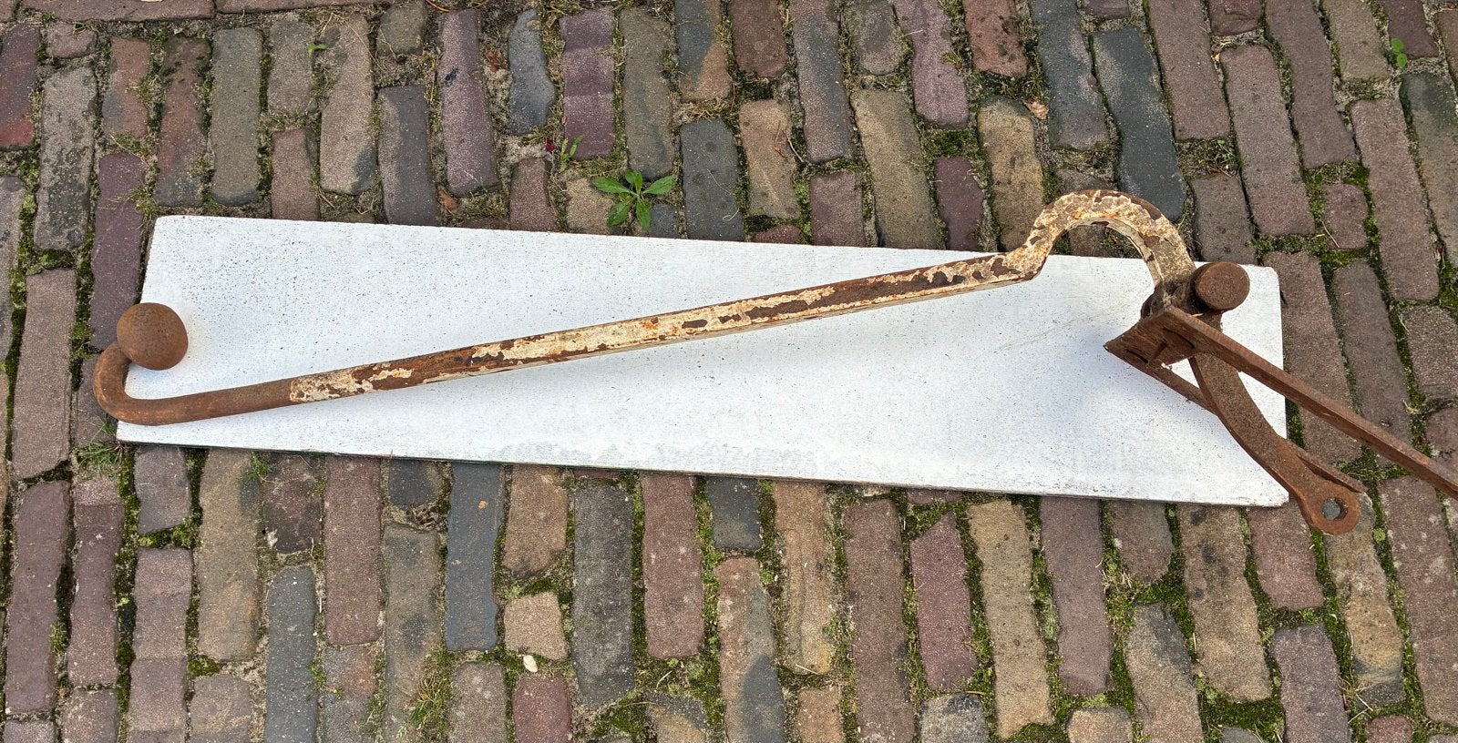 Antieke stadspomp zwengel/hengsel, Ophalen