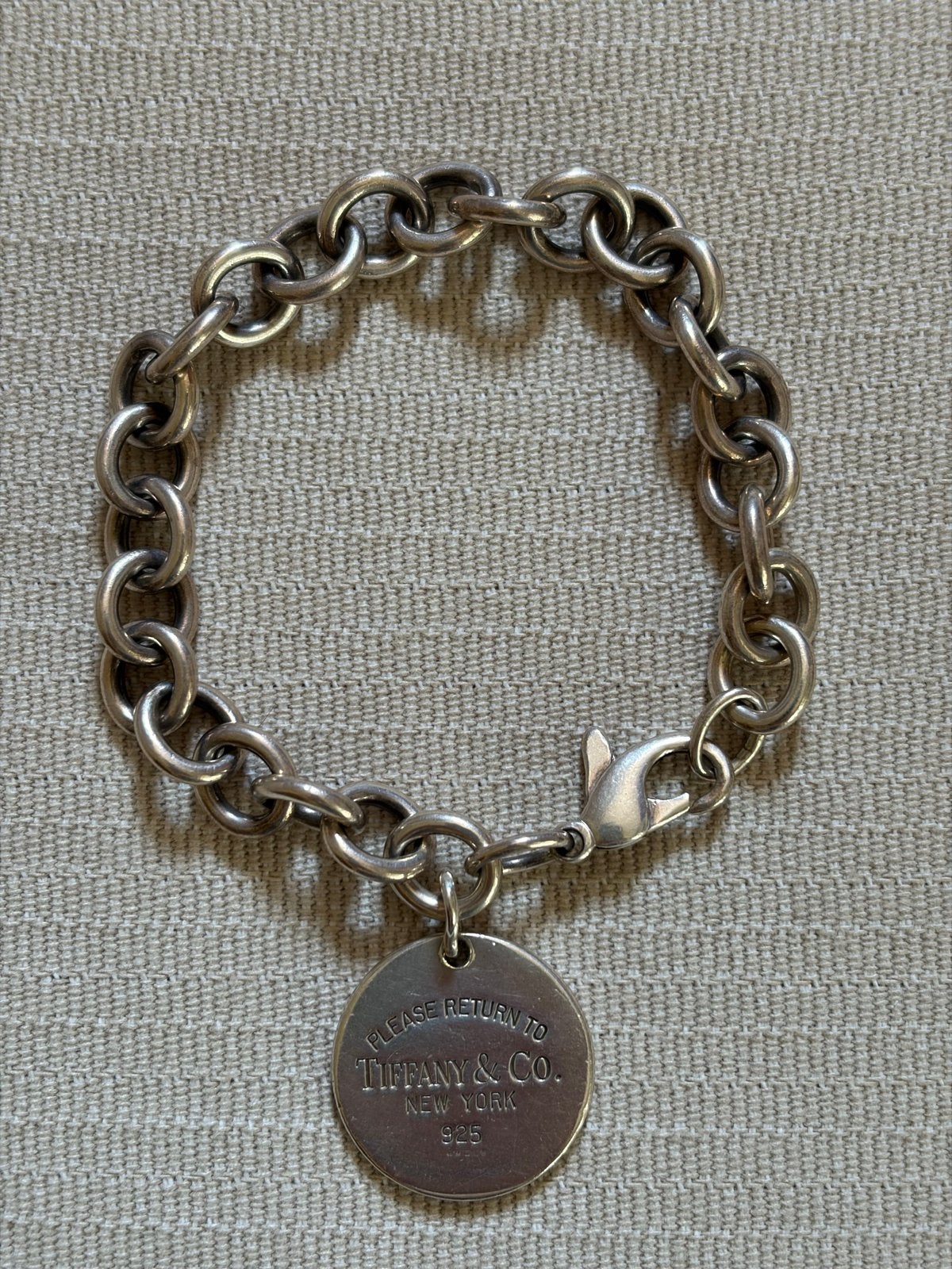 Zilveren Tiffany & Co armband met bedel, Ophalen of Verzenden, Gebruikt, Zilver, Met bedels of kralen