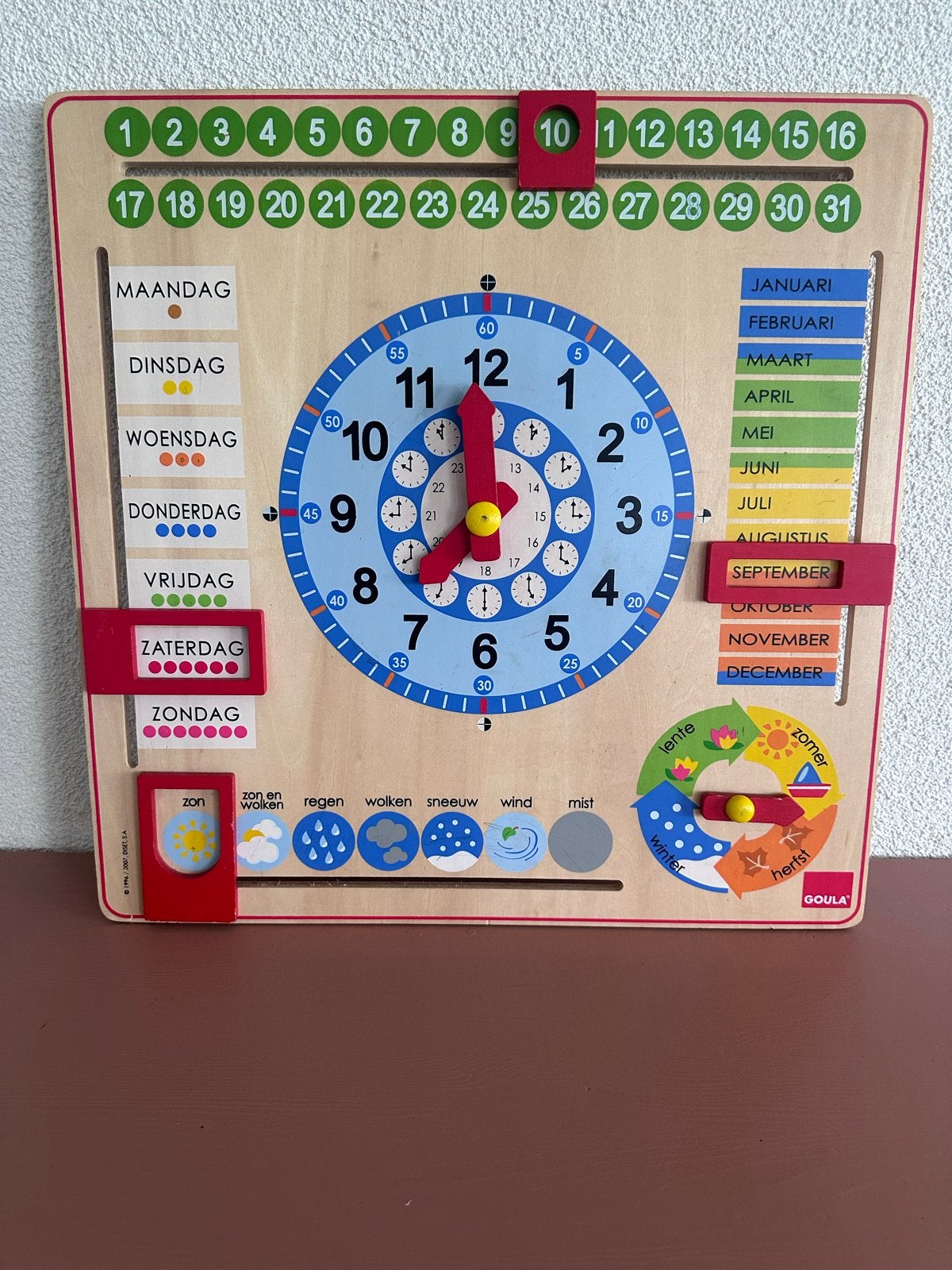 Goula Houten Kalenderklok, Ophalen of Verzenden, Gebruikt, Taal en Lezen
