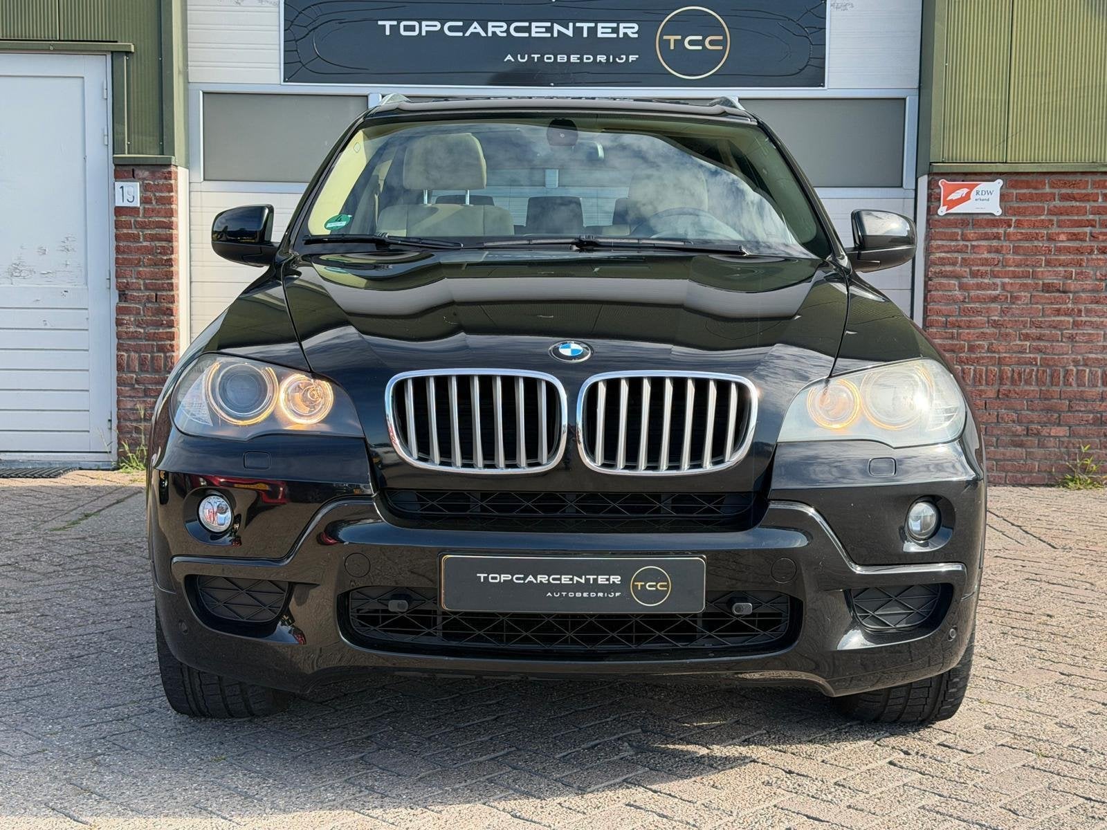 BMW X5 xDrive48i High Executive/PANO/TREKH/PARKS/NAVI/APK, Auto's, Gebruikt, 138 €/maand, Zwart, Leder
