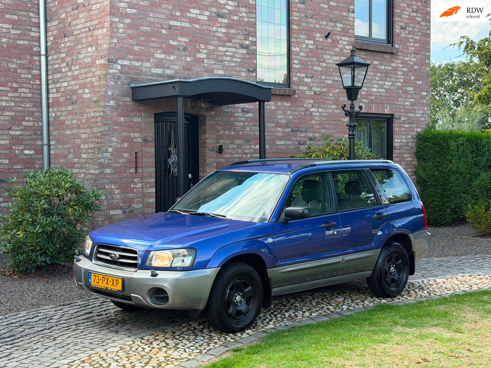 Subaru Forester 2.0 AWD X Automaat Clima Trekhaak, Auto's, Dealer onderhouden, 125 pk, Gebruikt, Blauw