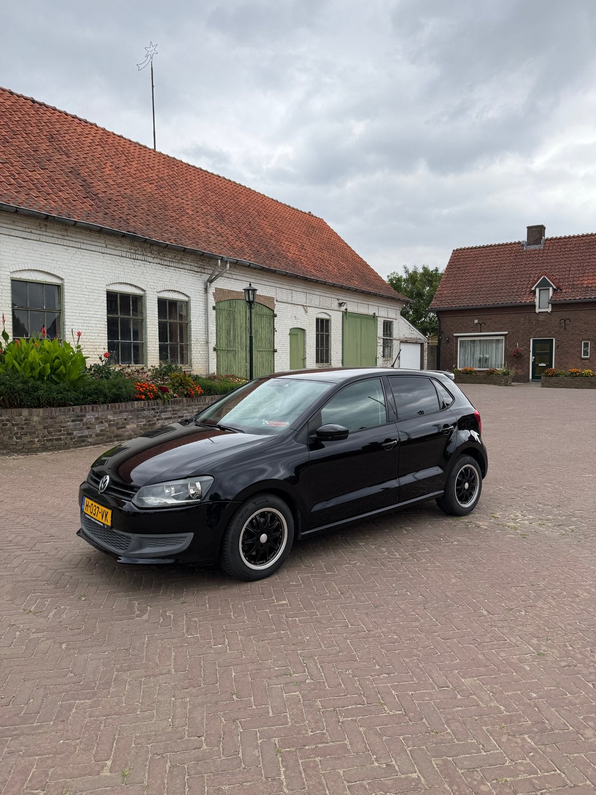Volkswagen Polo 1.4 16V FSI 63KW 2009 Zwart, Voorwielaandrijving, 970 kg, Stof, 40 €/maand
