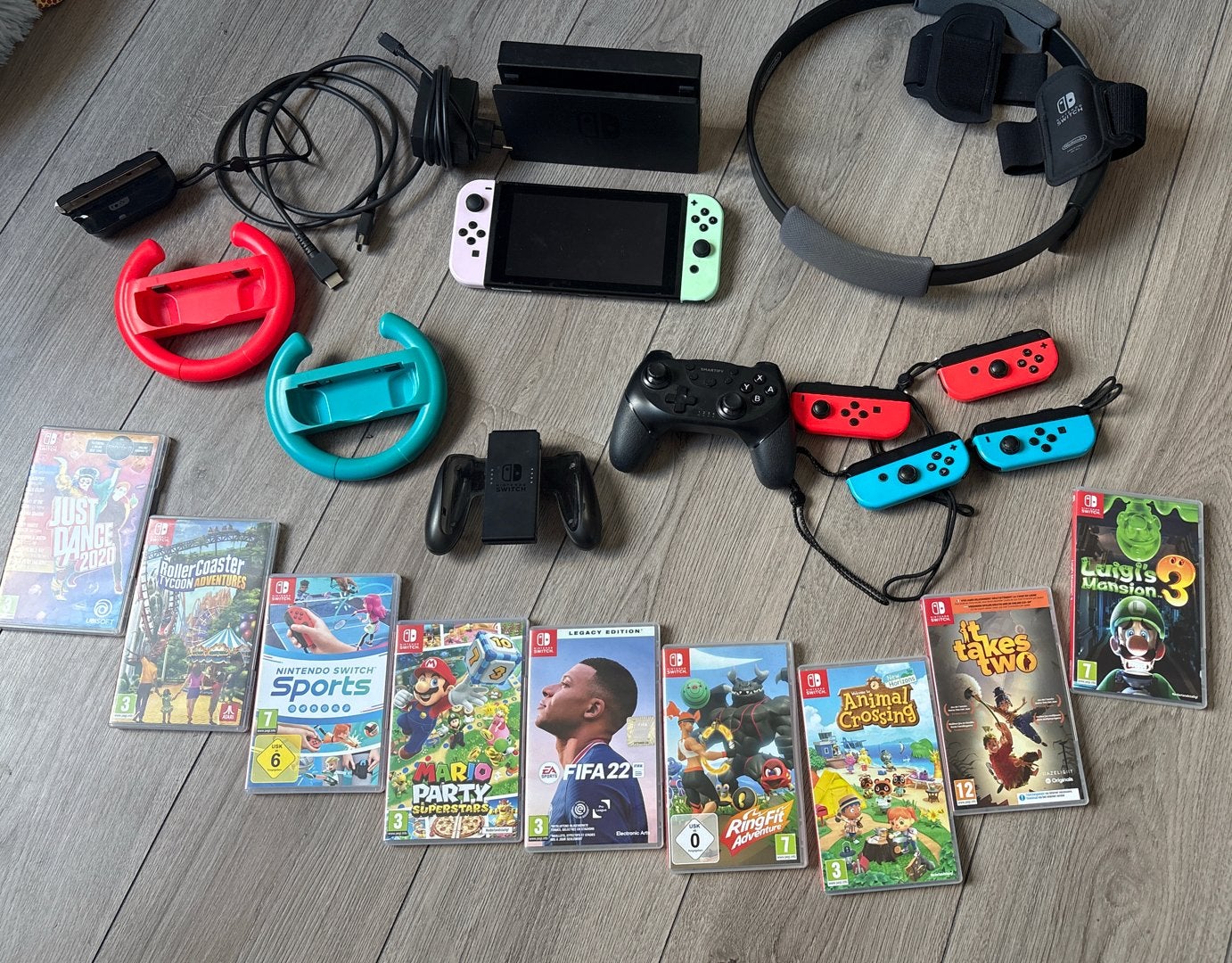 Nintendo Switch Compleet Pakket + Pro Controller + 9 Games, Spelcomputers en Games, Ophalen, Switch Original, Met 3 controllers of meer