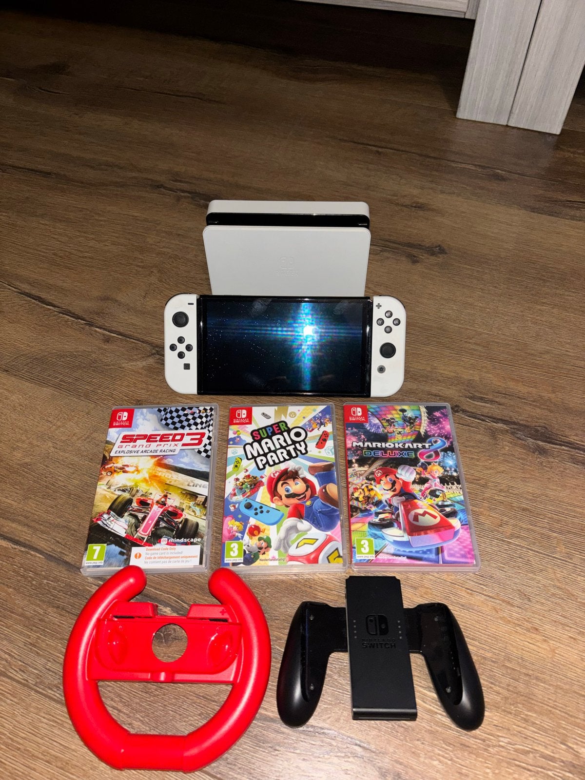 Nintendo Switch OLED met 3 games en accessoires, Met games, Met 2 controllers, Zo goed als nieuw, Switch OLED