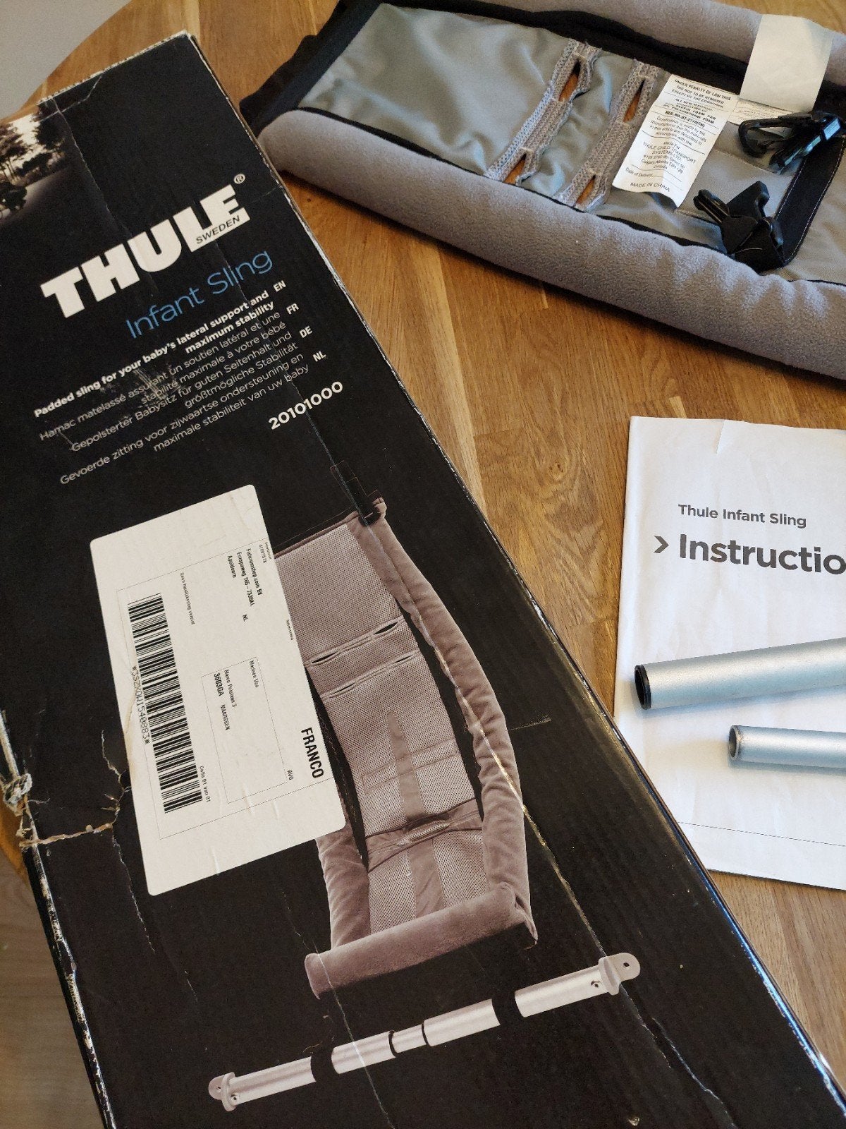 Thule Infant Sling inclusief verlengstuk riempje, Ophalen