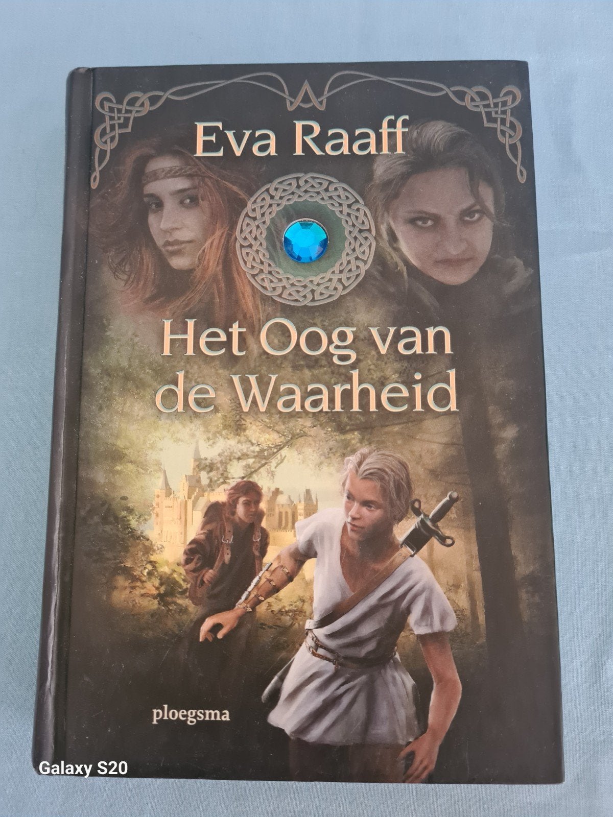 Het Oog van de Waarheid - Eva Raaff (Fantasy Jeugdboek), Boeken, Fantasy, Zo goed als nieuw, Ophalen of Verzenden