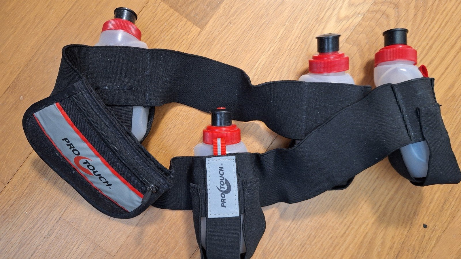 Race bottle belt- mt M- Pro Touch, Sport en Fitness, Bidons, Ophalen of Verzenden