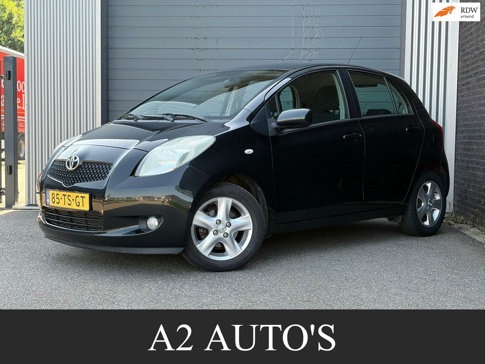 Toyota Yaris 1.3 VVTi Luna MMT Automaat|Ecc|Sensor, Stof, 750 kg, 4 cilinders, Zwart