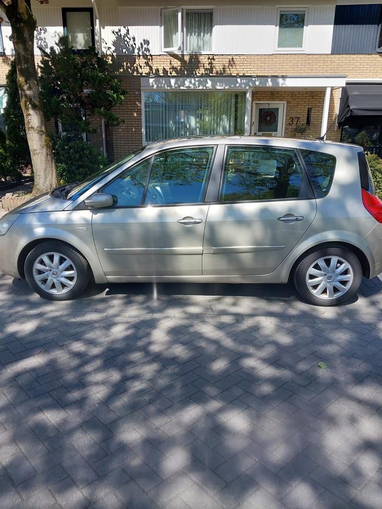 Renault scénic te koop aangeboden 2007., Auto's, Voorwielaandrijving, Stof, Zwart, Beige