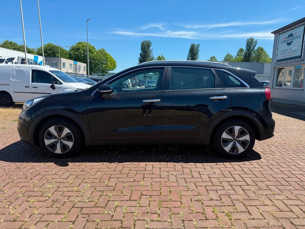 Kia Niro 1.6 GDi Hybrid First Edition, Auto's, Gebruikt, Leder en Stof, Zwart, Origineel Nederlands