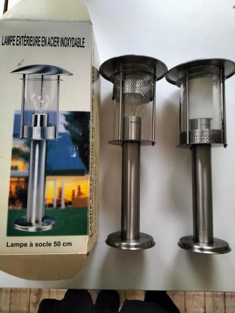 2 nieuwe roestvrijstalen buitenlampen., Tuin en Terras, Ophalen, Minder dan 50 watt, Staande lamp, Nieuw