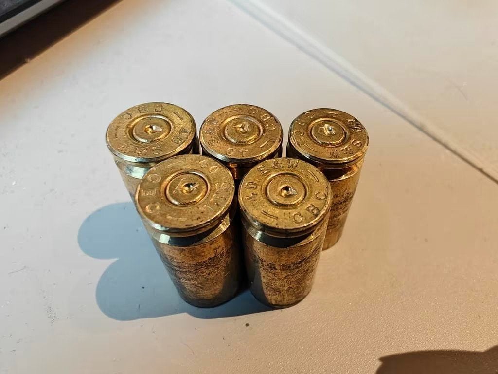5 LEGE hulzen in het kaliber .40S&W, Ophalen of Verzenden, Landmacht, Azië, Hulzen of Bodemvondsten