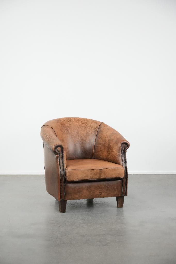 Tijdloze vintage schapenleren clubfauteuil met karakter, Huis en Inrichting, Fauteuils, Ophalen, Gebruikt, ., Vintage