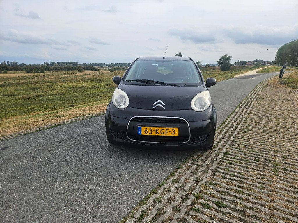 Citroën C1 1.0 3-DRS 2009 Zwart, Auto's, Voorwielaandrijving, Stof, Zwart, 4 stoelen