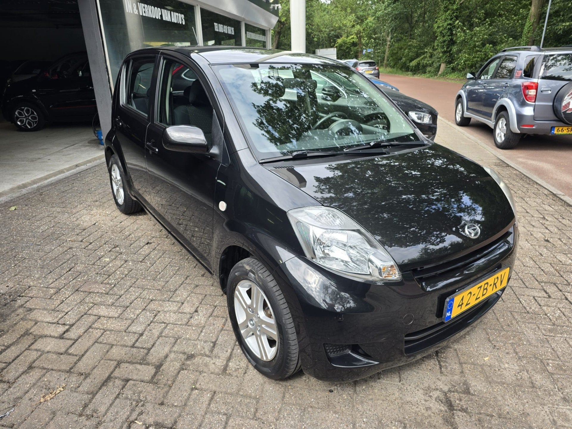 Daihatsu Sirion 2 1.0-12V Premium | 1E EIGENAAR |3/6 OF 12MN, Auto's, Daihatsu, Voorwielaandrijving, Stof, Gebruikt, Zwart