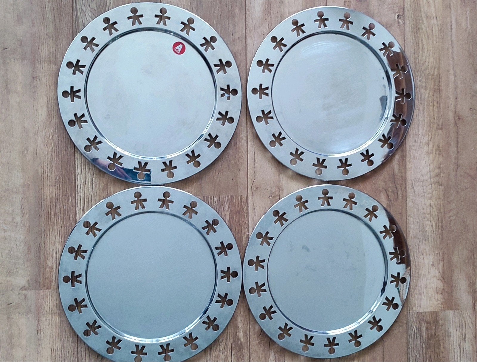 Alessi Dienblad/Schaal - Set van 4 Onderbord Girotondo Kong, Gebruikt, Rond, Ophalen of Verzenden, Metaal