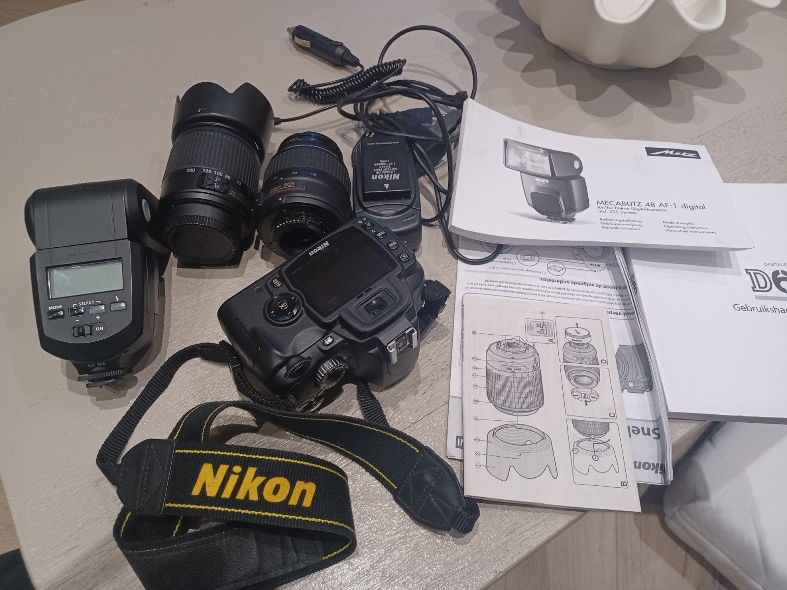 Nikon D60 Spiegelreflexcamera met 2 lenzen en accessoires, Gebruikt, Spiegelreflex, Draagriem, Nikon