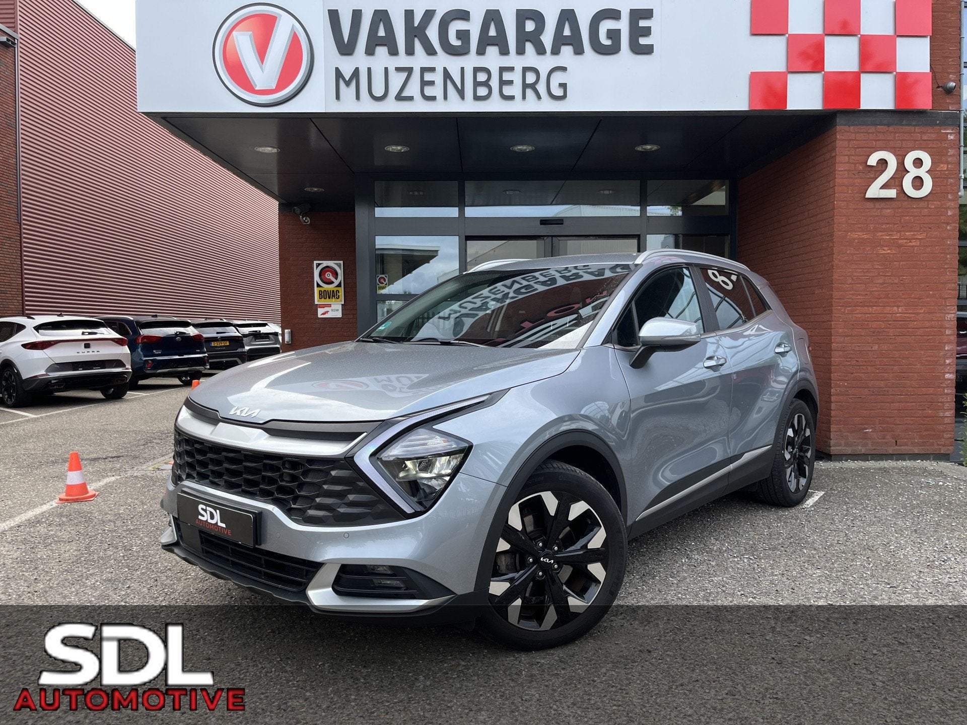Kia Sportage 1.6 T-GDi Plug-in Hybrid AWD DynamicPlusLine AD, Auto's, Kia, Automaat, Gebruikt, 4 cilinders, Leder en Stof