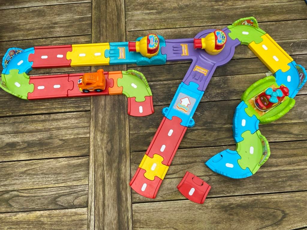 Vtech Racebaan met 23 Baanstukken en 2 Raceauto's, Ophalen of Verzenden, Gebruikt, 2 tot 4 jaar