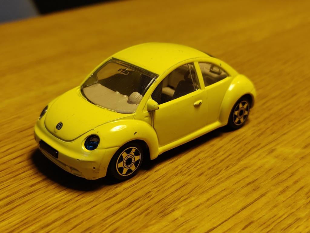 Burago Volkswagen New Beetle GEEL, Ophalen of Verzenden, Auto