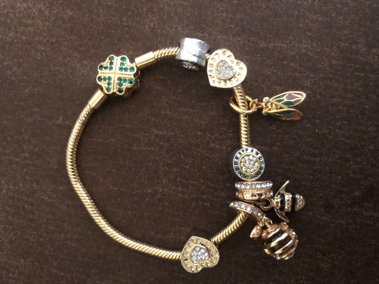 Gouden bedelarmband met diverse bedels, maat 20, Sieraden, Tassen en Uiterlijk, Armbanden, Overige materialen, Gebruikt, Ophalen of Verzenden